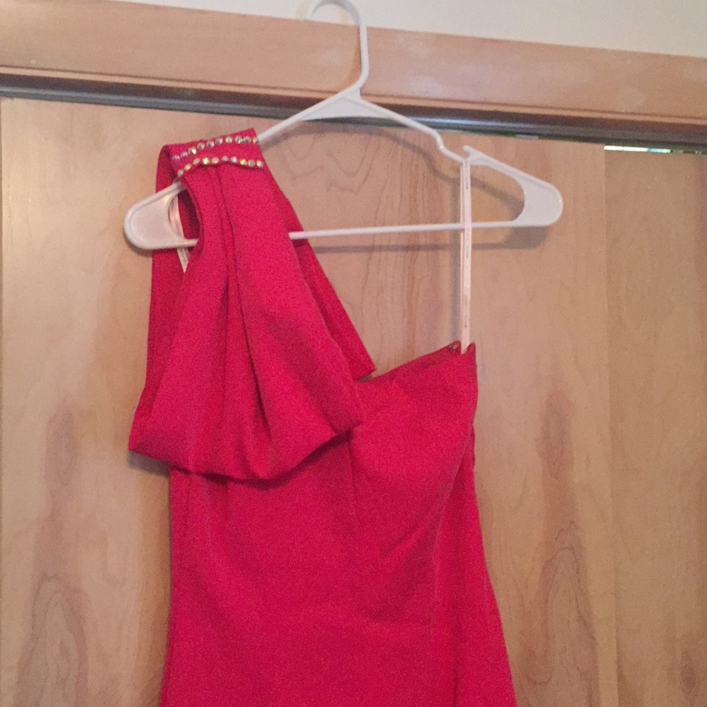 Pink dress with bow design on shoulder